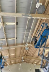 outdoor ceiling during prep and industrial painting