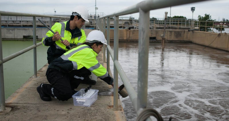 Facility team monitoring water systems during industrial water damage review in Danville, VA